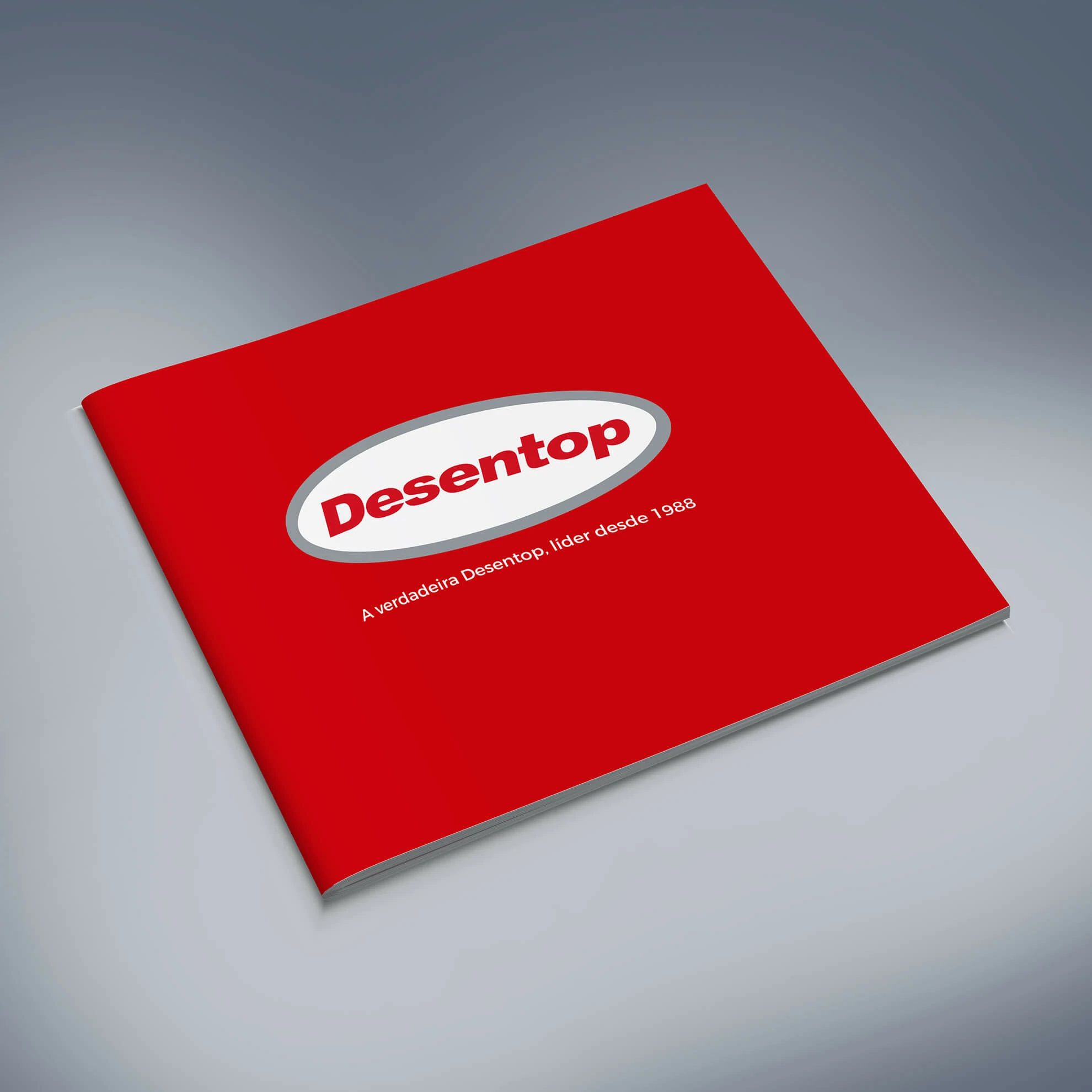 Desentop institutional brochure cover mockup in the company red visual identity