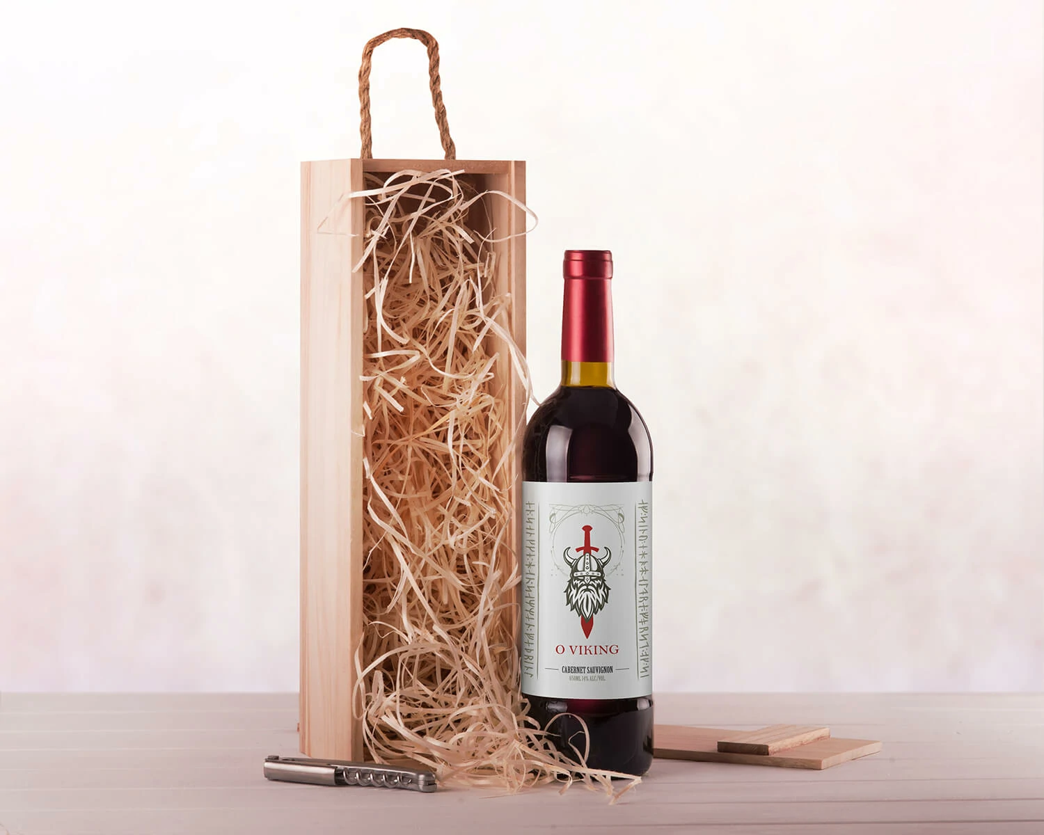 O Viking wine bottle presented beside a wooden gift box and corkscrew